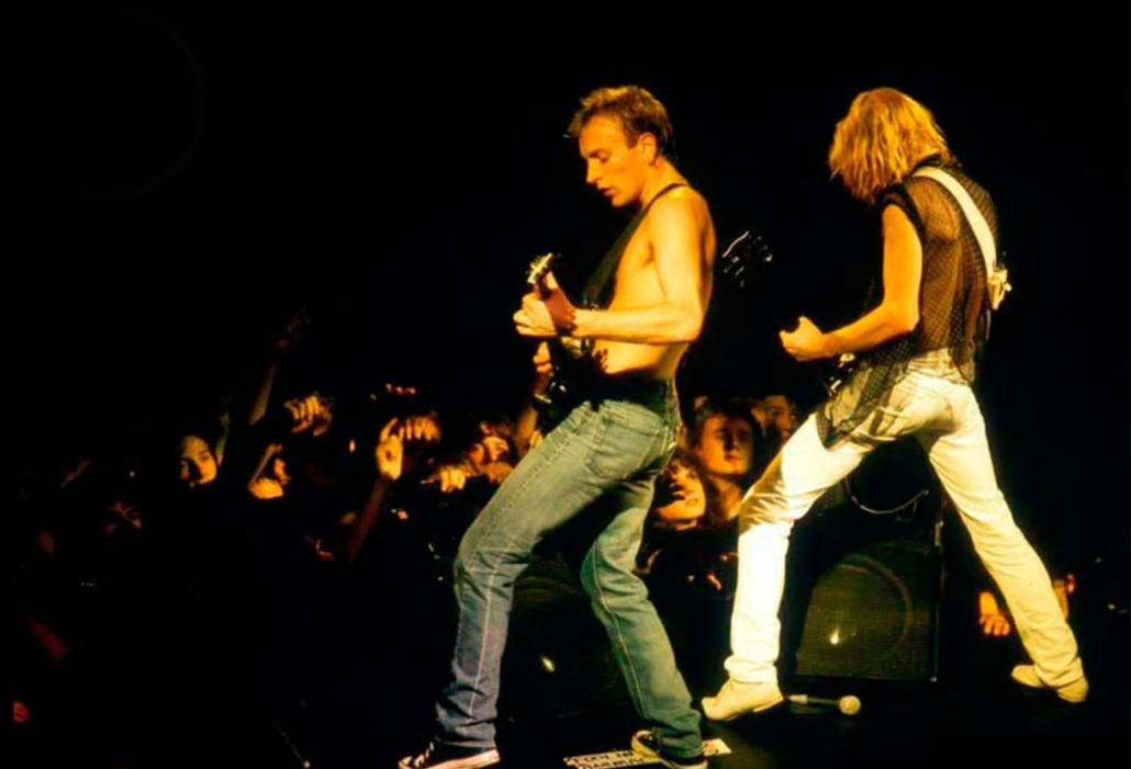 Steve Clark and Phil Collen live on tour